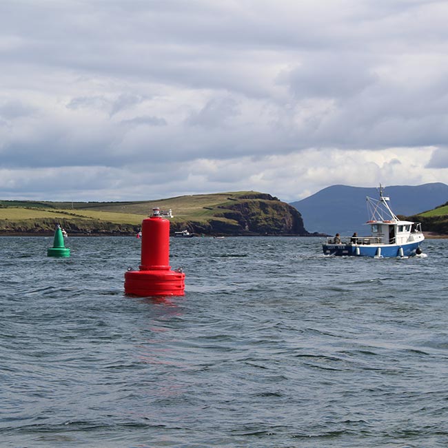 Red and green JFC Marine G1200 Gannet Navigation Buoy in use
