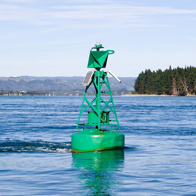 Green JFC Marine Steel Navigation Buoy in use